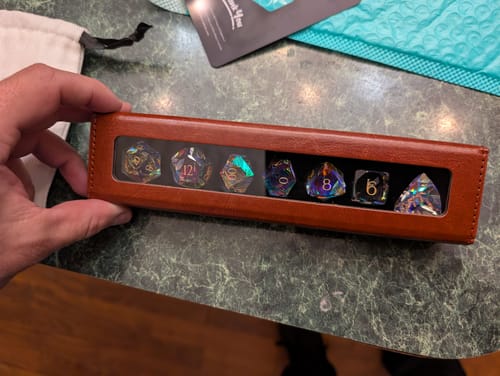 Customer photo review of URWizards D&D Multi-faceted Prism Glass Engraved Dice Set