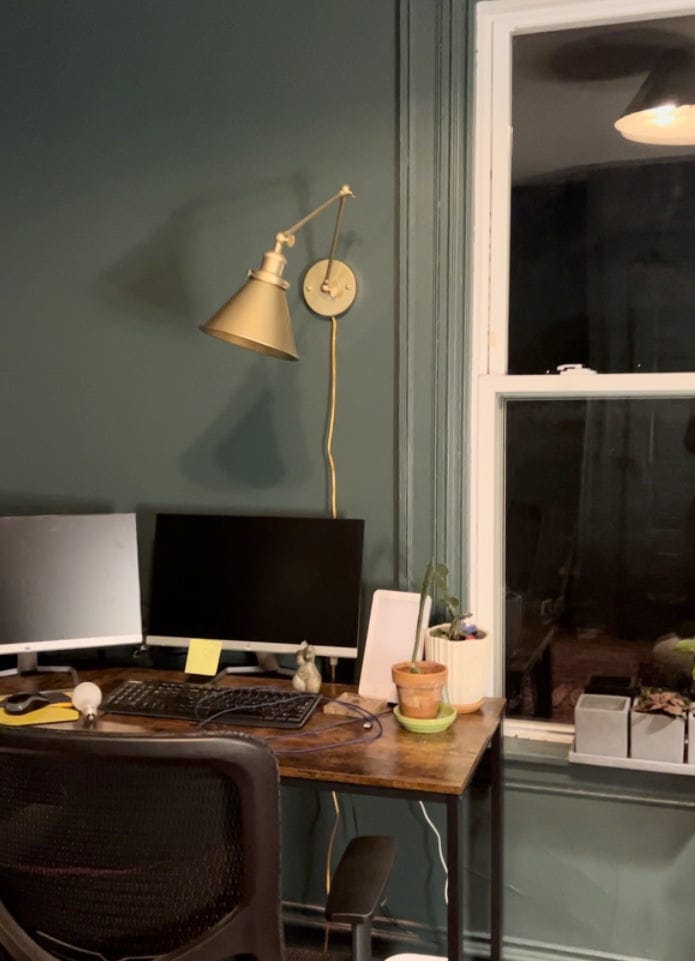 Customer photo review of Mid-Century Modern Metal Swing Arm Wall Lamp for Bedroom/Living Room