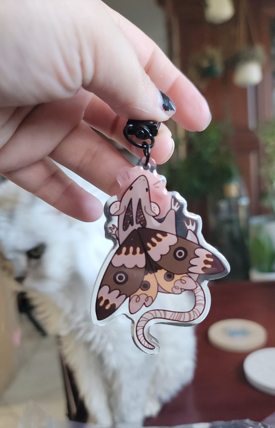 Customer photo review of Mothrat Keychain