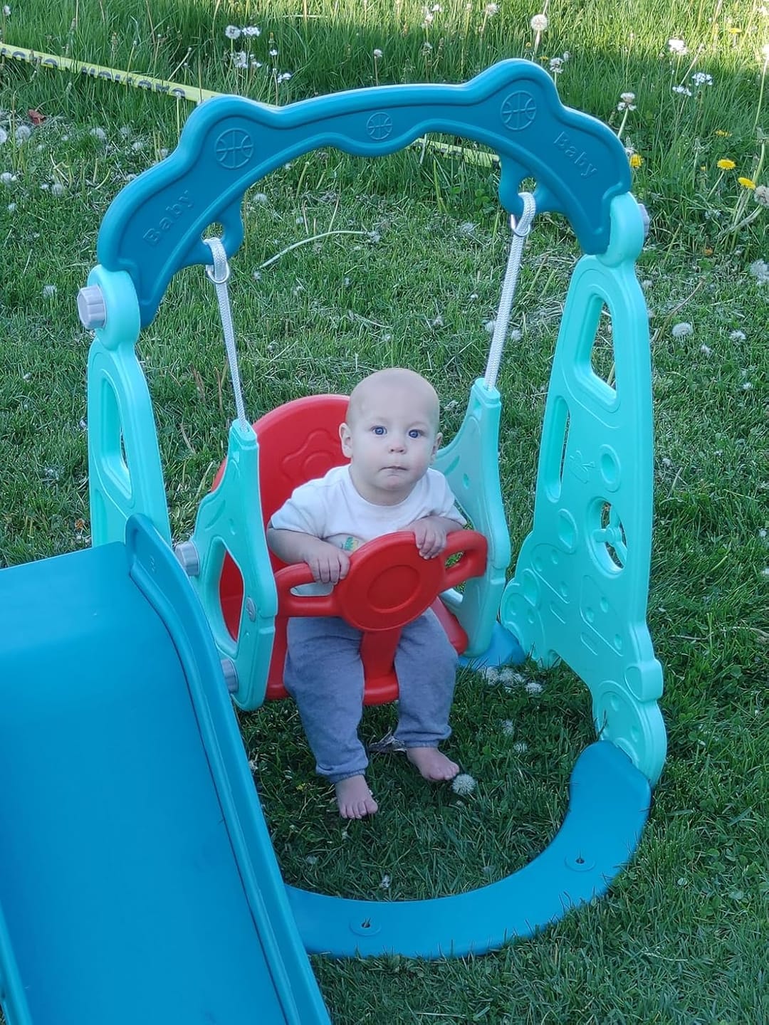 Customer photo review of TOBBI & NYEEKOY 3-in-1 Car-Themed Toddler Slide and Swing Set