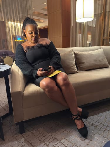 Customer photo review of Caitlin Black Feather Bandage Midi Dress