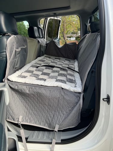 Customer photo review of NEW Waterproof Hard Bottom Car & Truck Seat Foldable Hammock Cover With Storage Pockets, Side Flaps, Headrest Straps, Seat Anchors, & Mesh Window (+FREE SAFETY BELT!)