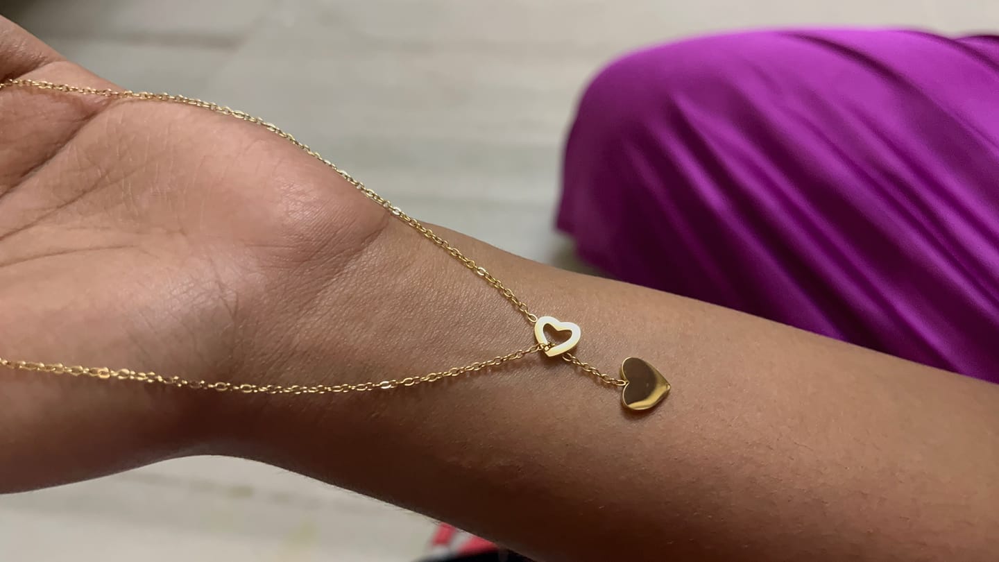 Customer photo review of Two Heart Gold Lariat Necklace
