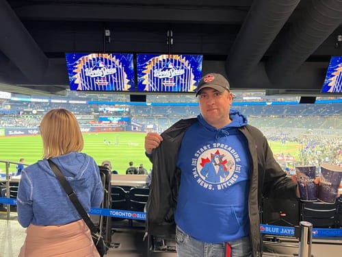 Customer photo review of Start Spreading The News Hoodie