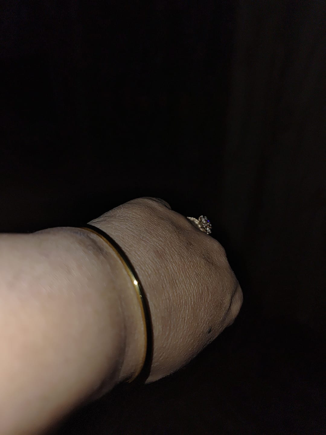 Customer photo review of Slim Gold Bangle