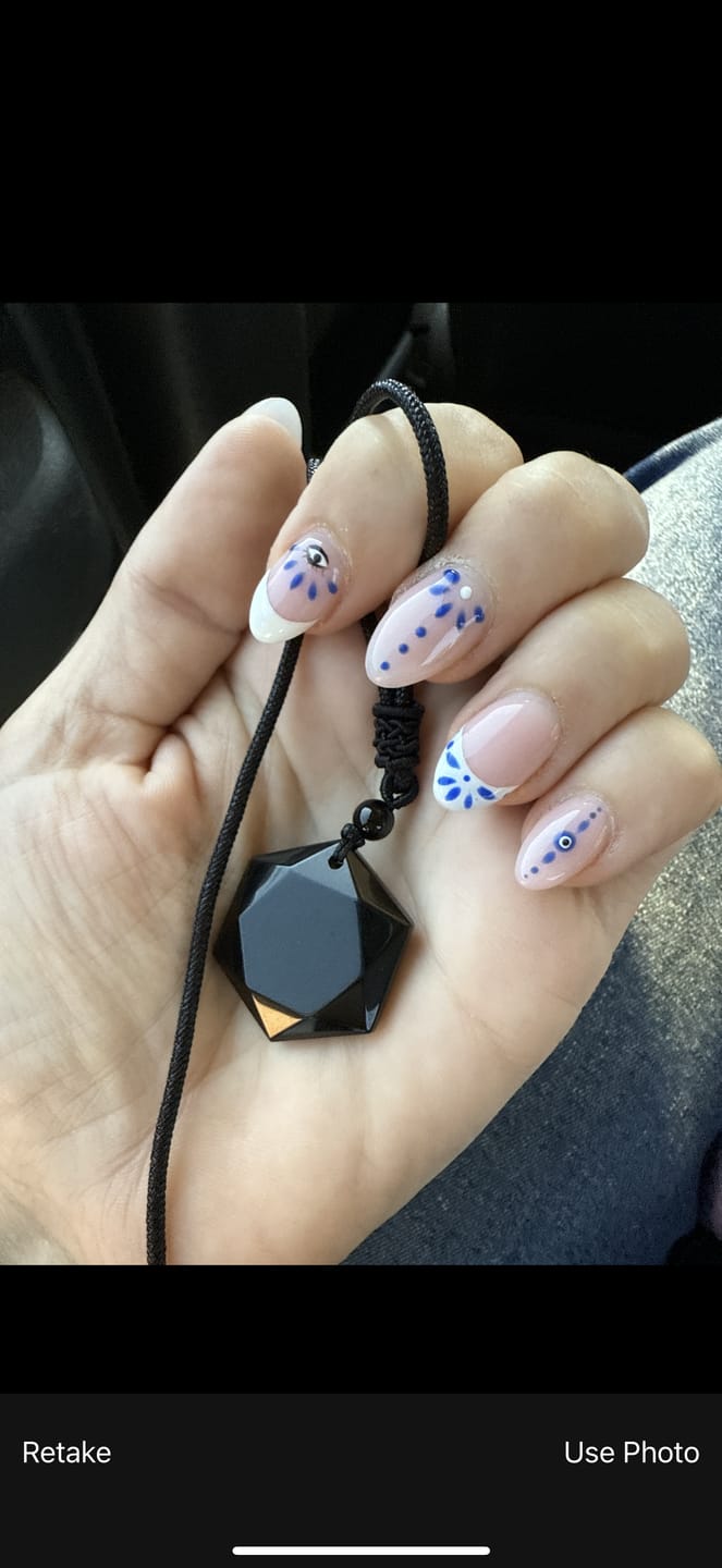 Customer photo review of Obsidian Self Protection Necklace