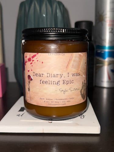 Customer photo review of Stefan Salvatore Candle | Vampire Diaries Inspired | Bookish Soy Candle with Rosewood, Amber & Vetiver | 8 oz Wood Wick