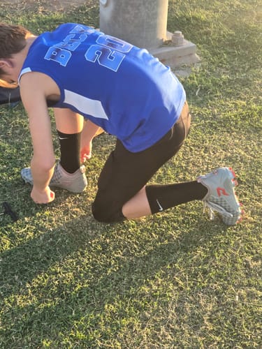Customer photo review of Tom and Jerry "Cheddar Chase" Football Cleats - Quantum Speed by Phenom Elite