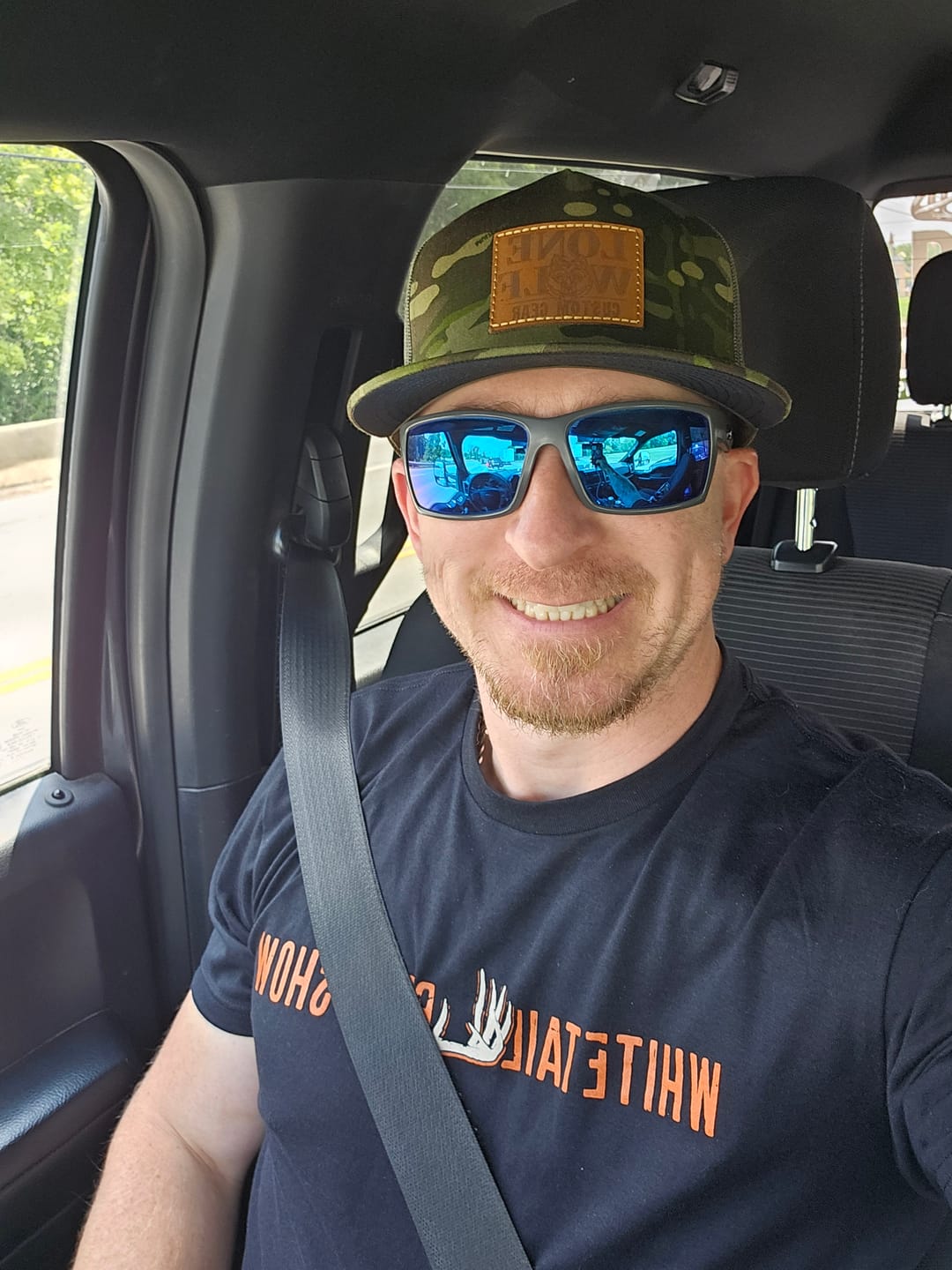 Customer photo review of Lone Wolf Custom Gear Flat Bill Trucker Hat