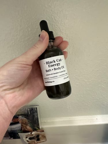 Customer photo review of Black Cat Energy Bath & Body Oil