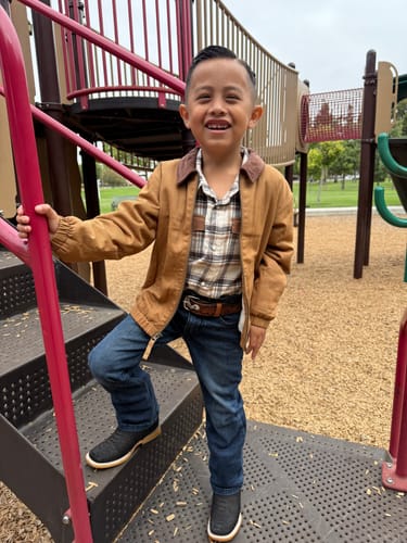 Customer photo review of Chaparral Kid’s Python Print Black Boot