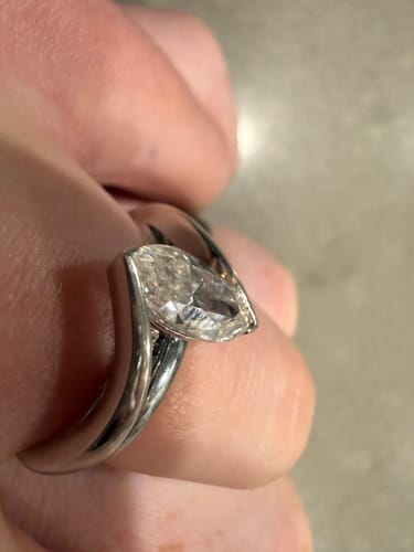 Customer photo review of Anne Rose Marquise Modified H&A cut pave moissanite engagement ring