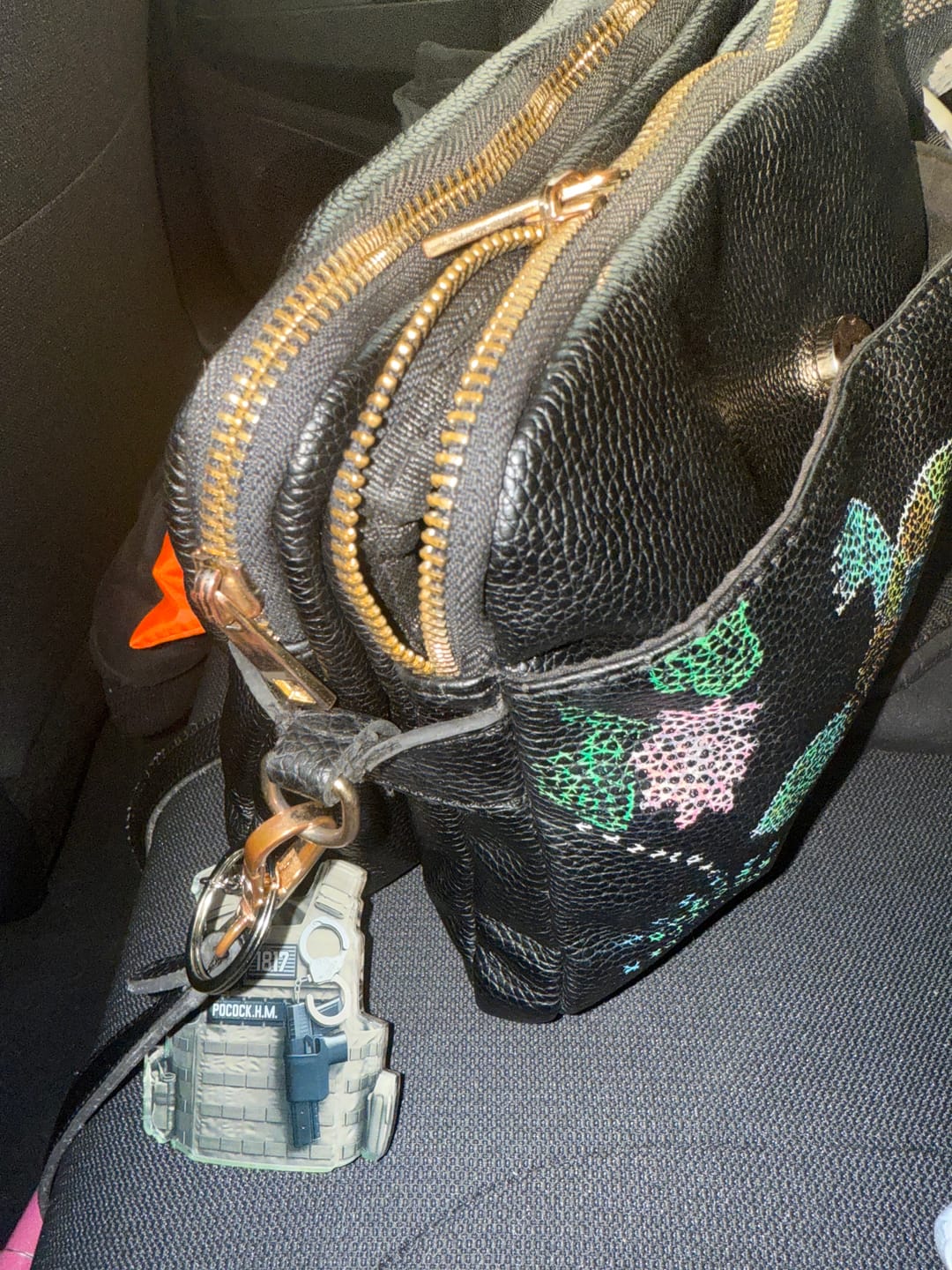 Customer photo review of Personalized Police Bulletproof Vest Acrylic Keychain