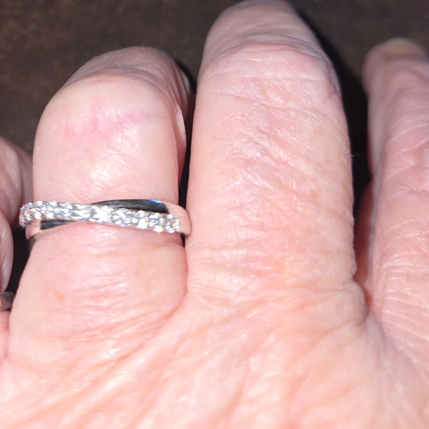 Customer photo review of Moissanite by Cate & Chloe Emerson 0.36tcw Round Cut 925 Sterling Silver 18k White Gold Plated Wedding Band
