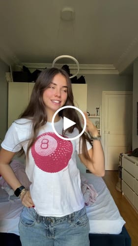 Customer video review of lucky shot baby tee