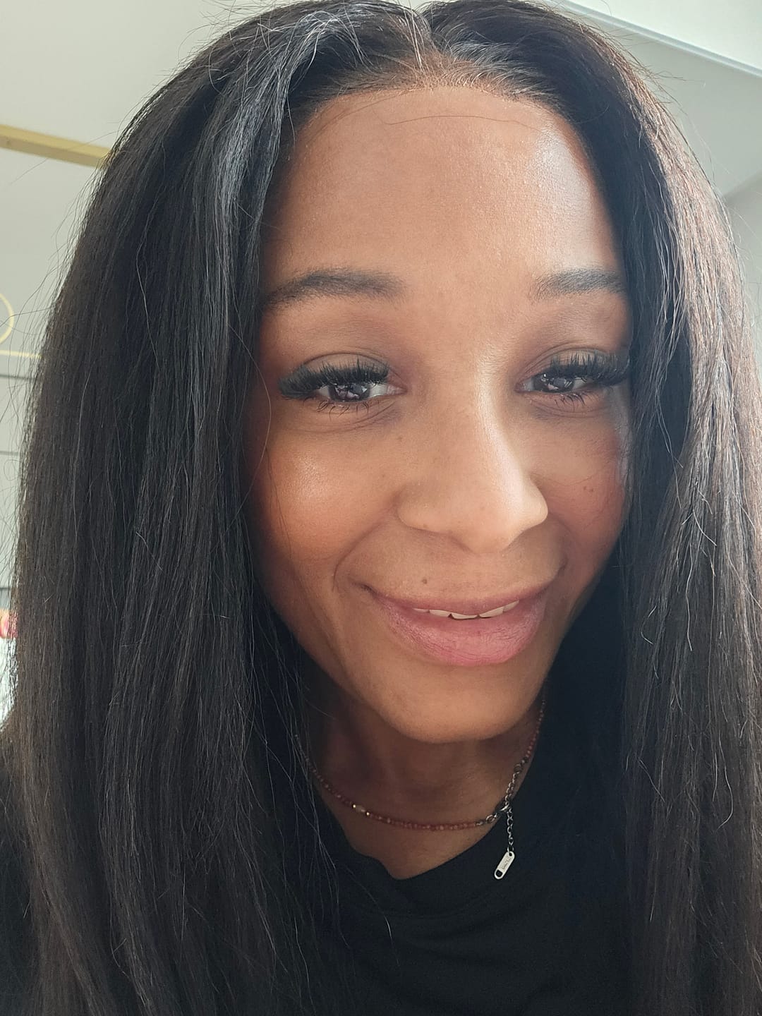 Customer photo review of Undetectable Skin Melt Clear Lace Kinky Straight Brazilian 13 x 6 Lace Front Wig LFC08