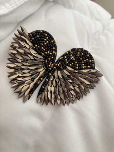 Reseña con foto de un cliente sobre Aros Alas Fiesta