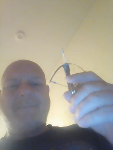 Customer photo review of Mini Metal Crossbow With Arrows V2