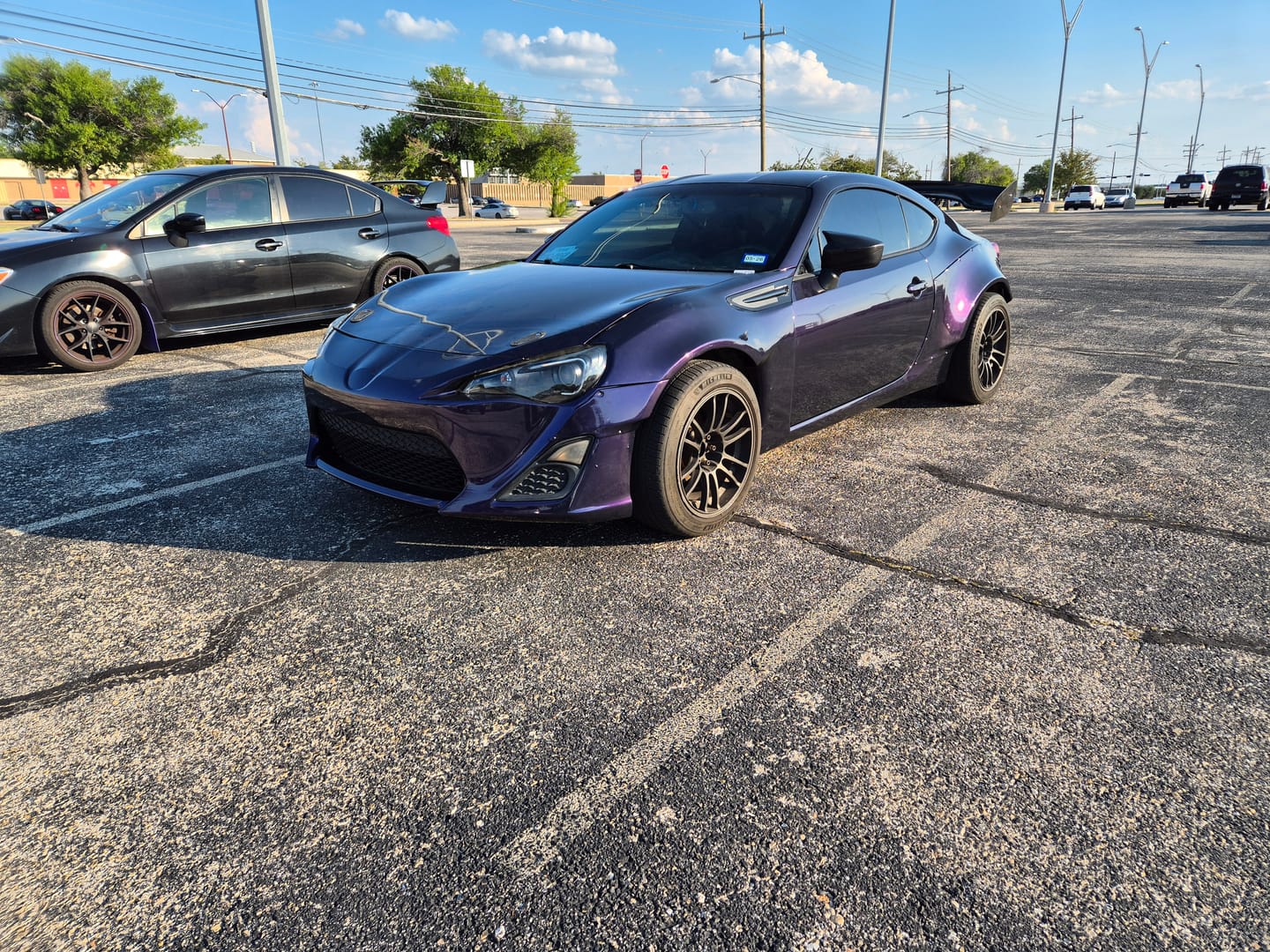 Customer photo review of Glossy Metallic Midnight Purple Vinyl Wrap