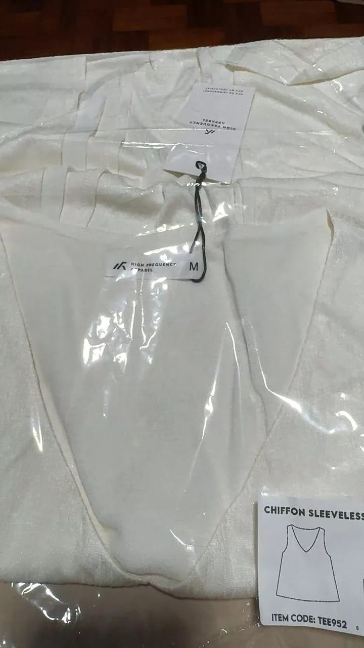 Customer photo review of HFA Women's Chiffon Sleeveless V-Neck Top