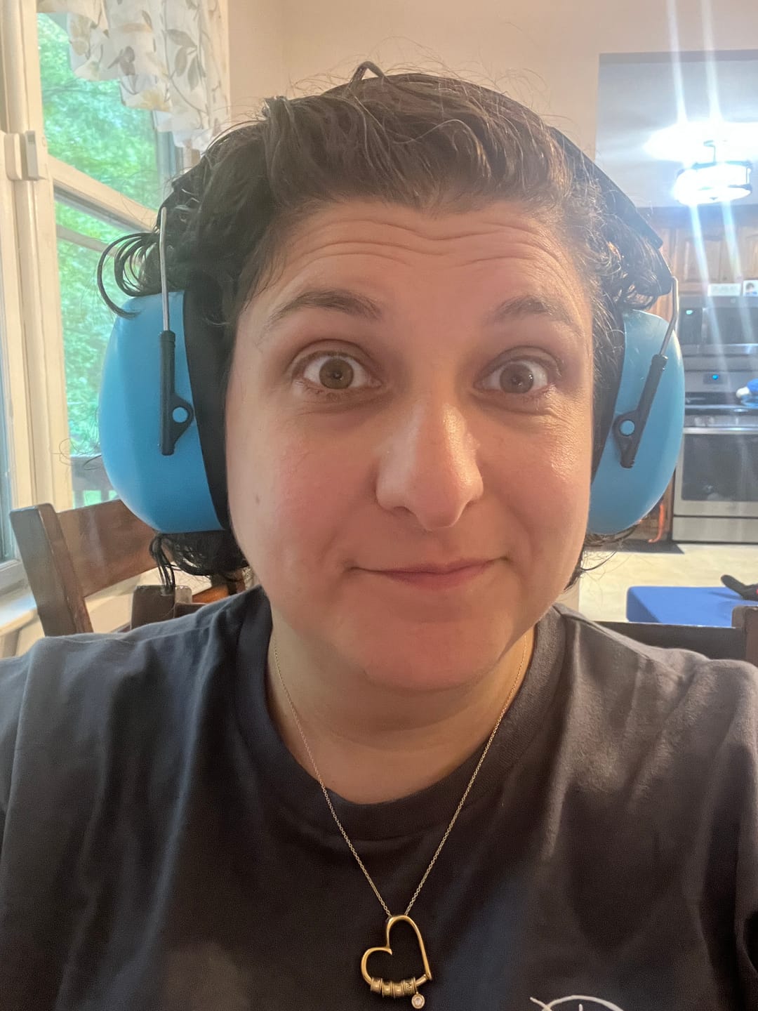 Customer photo review of Decibel Defense Safety Earmuffs in Blue
