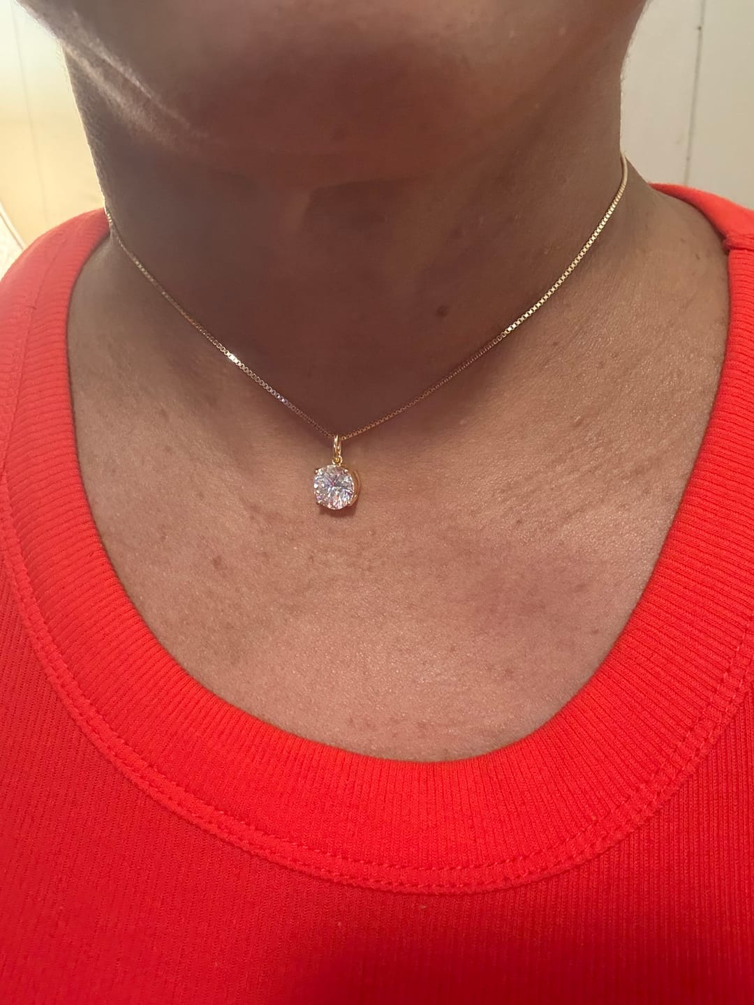 Customer photo review of Round Solitaire Stud Earrings - Moissanites