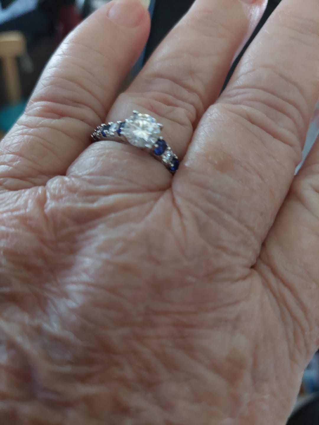 Customer photo review of Round Moissanite With Sapphire Pave Engagement Ring
