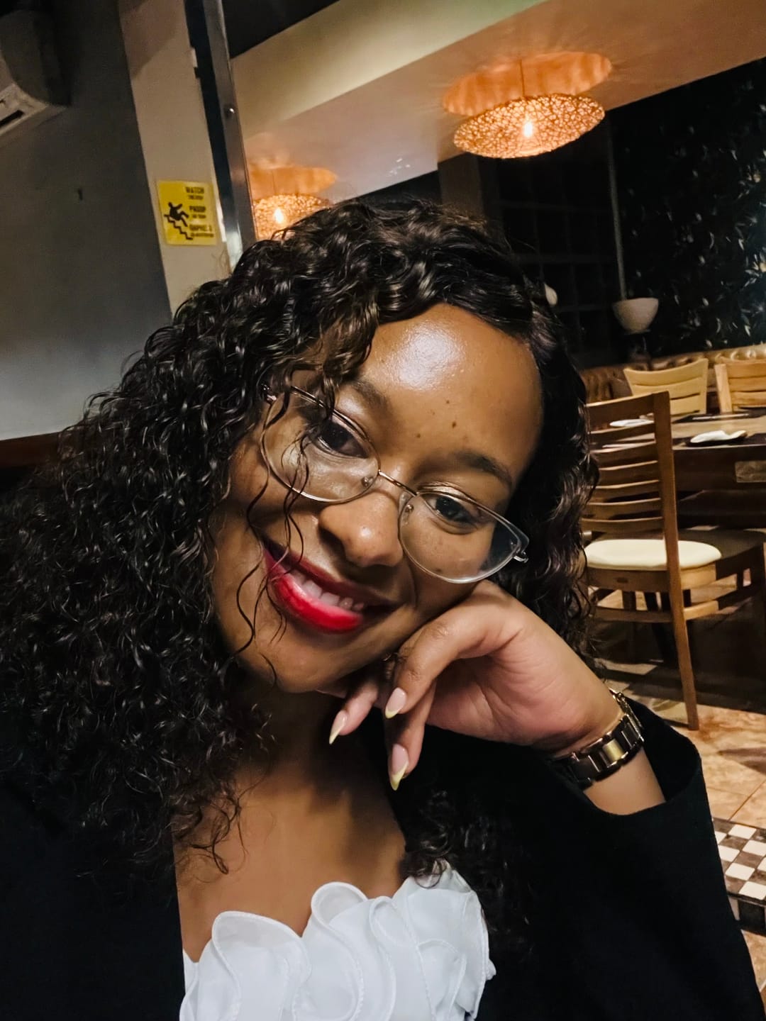Customer photo review of Warm Brown Glueless Double Drawn Curly 14 Inch Wig