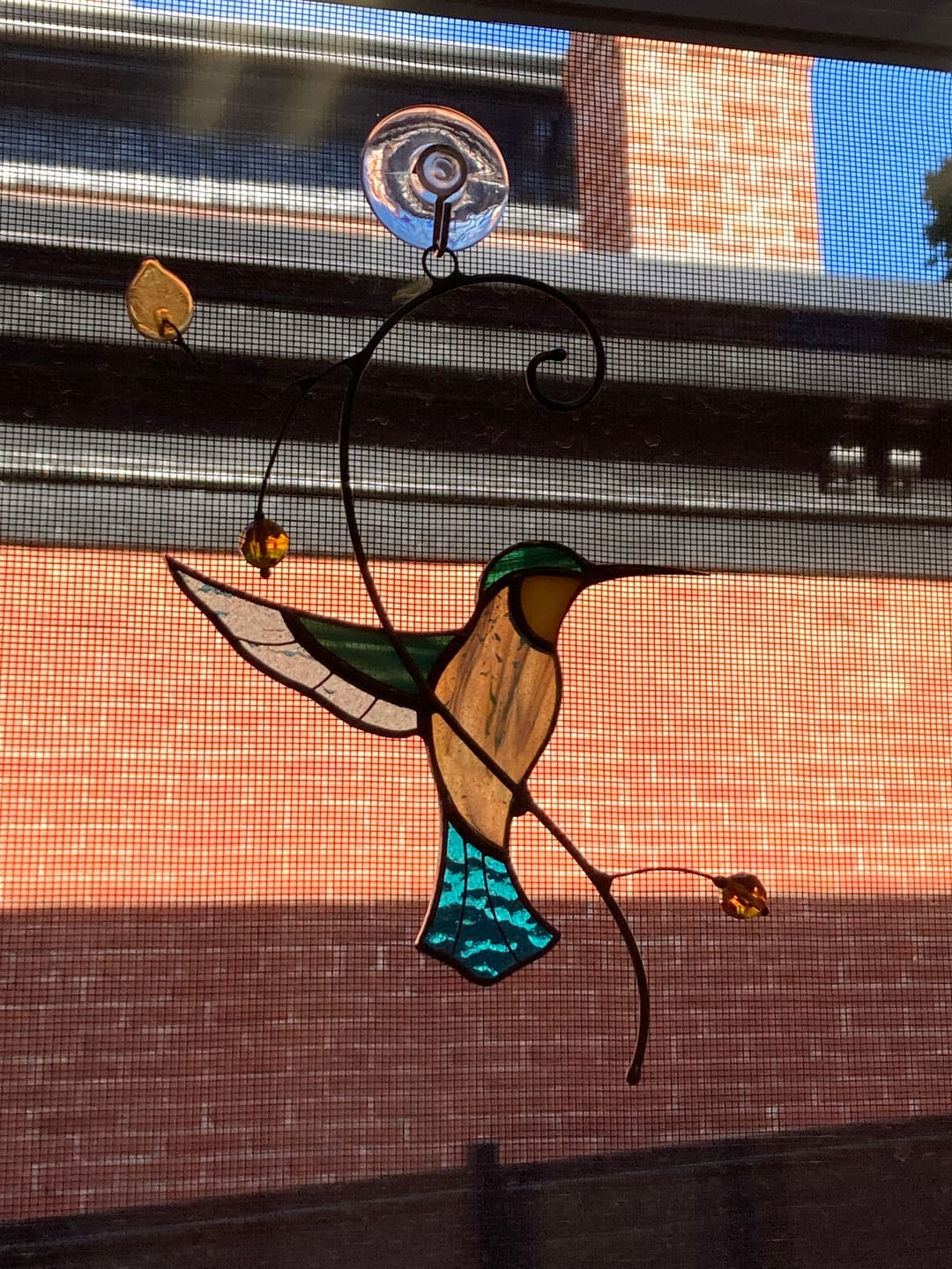 Customer photo review of Turquiose hummingbird ornament - Stained glass window hanging