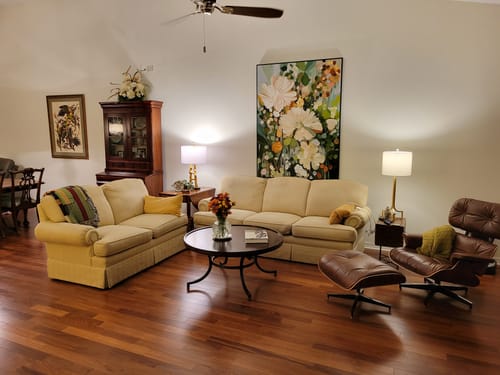 Customer photo review of Enchanted Blooms Abstract Floral Canvas – Hand-Painted Vertical Wall Art for Living Room