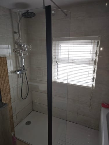 Customer photo review of Aquadart 8mm 300mm Wetroom Flipper Panel