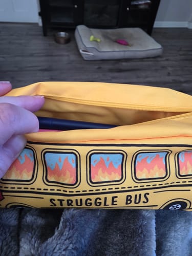Customer photo review of Struggle Bus Pencil Case