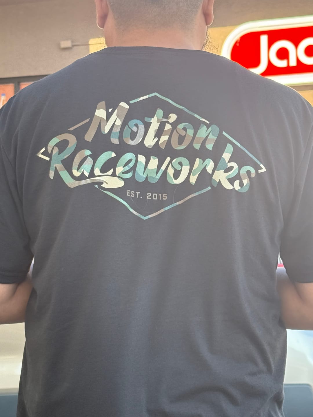 Customer photo review of Motion Camoflauge Black Shirt District