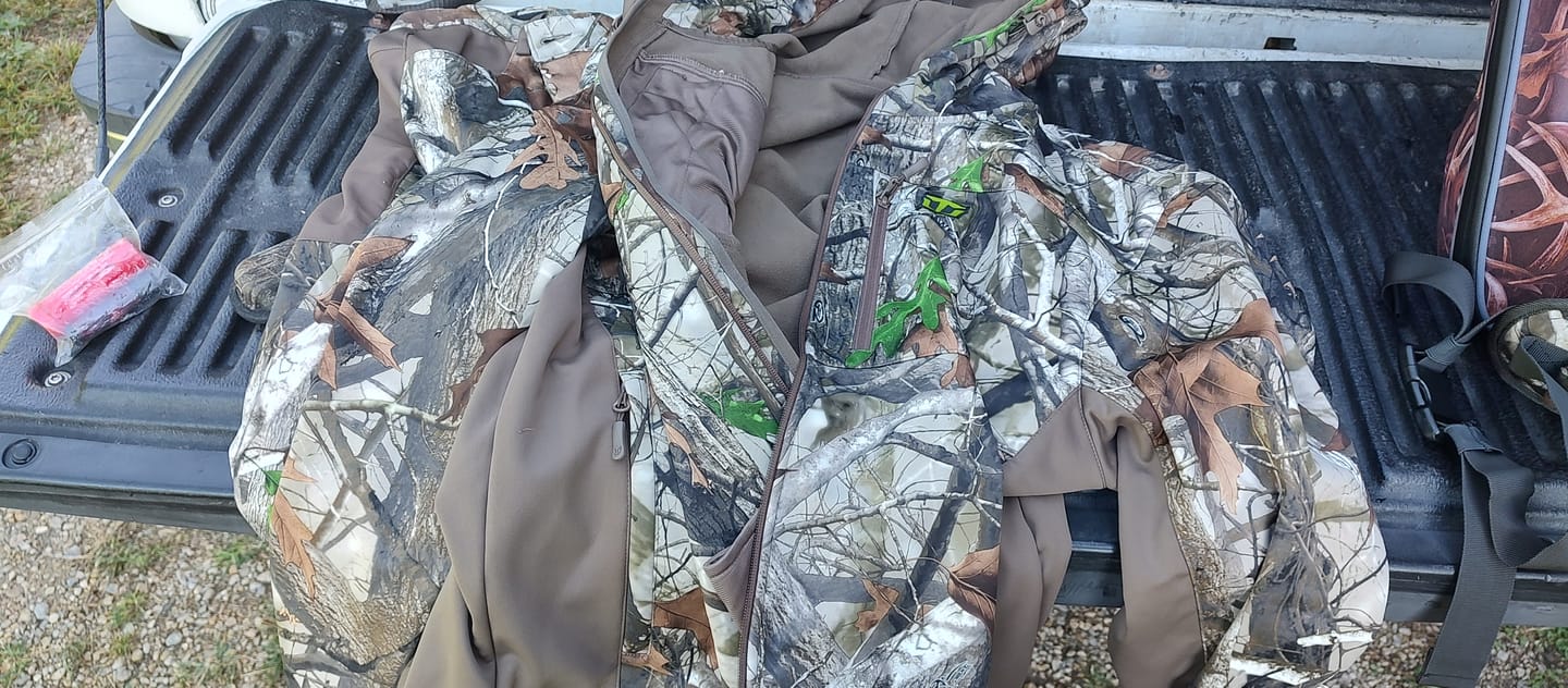 Customer photo review of Men's Hunting Clothes,Silent Water Resistant Camo Hunting Suits