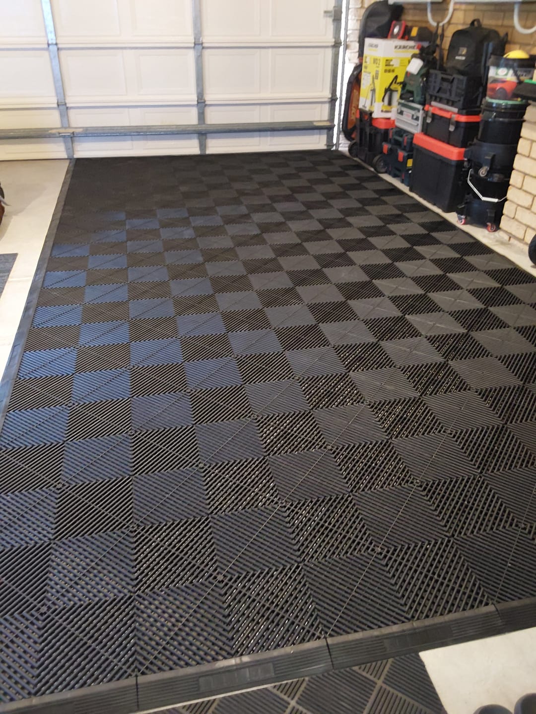 Customer photo review of Single Car Podium Pad Modular Floor Tile Set, choose your colours.