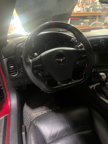Customer photo review of Genuine Carbon Fiber Steering Wheel With Button Trim For C6 Corvette 2006-2011