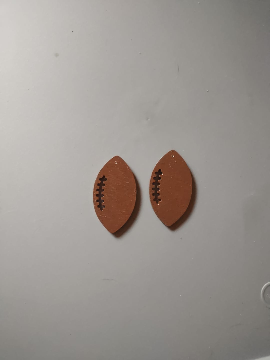 Customer photo review of Unfinished Wood Football Threads Shape - Sports Craft - up to 46" DIY