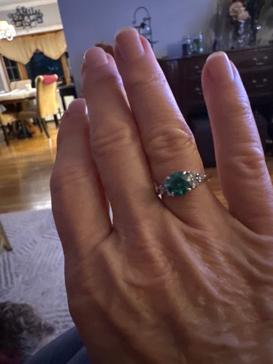 Customer photo review of Green Moissanite Side Stone Engagement Ring