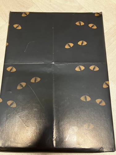Customer photo review of Darkness Eyes Wrapping Paper