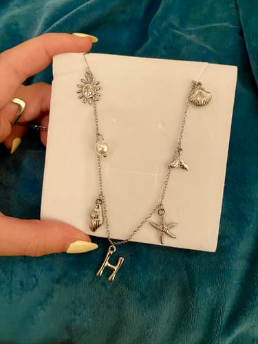 Customer photo review of SILVER OCEAN LETTER NECKLACE