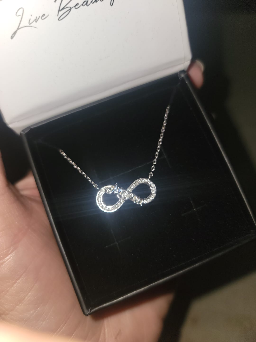 Customer photo review of Robin 18k White Gold Plated Mom Infinity Necklace with Swarovski Crystals