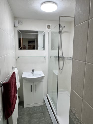 Customer photo review of ShowerWorX 900mm Wet Room 8mm Screen & Support Bar