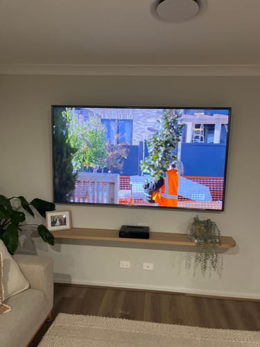 Customer photo review of Curved Floating Shelf