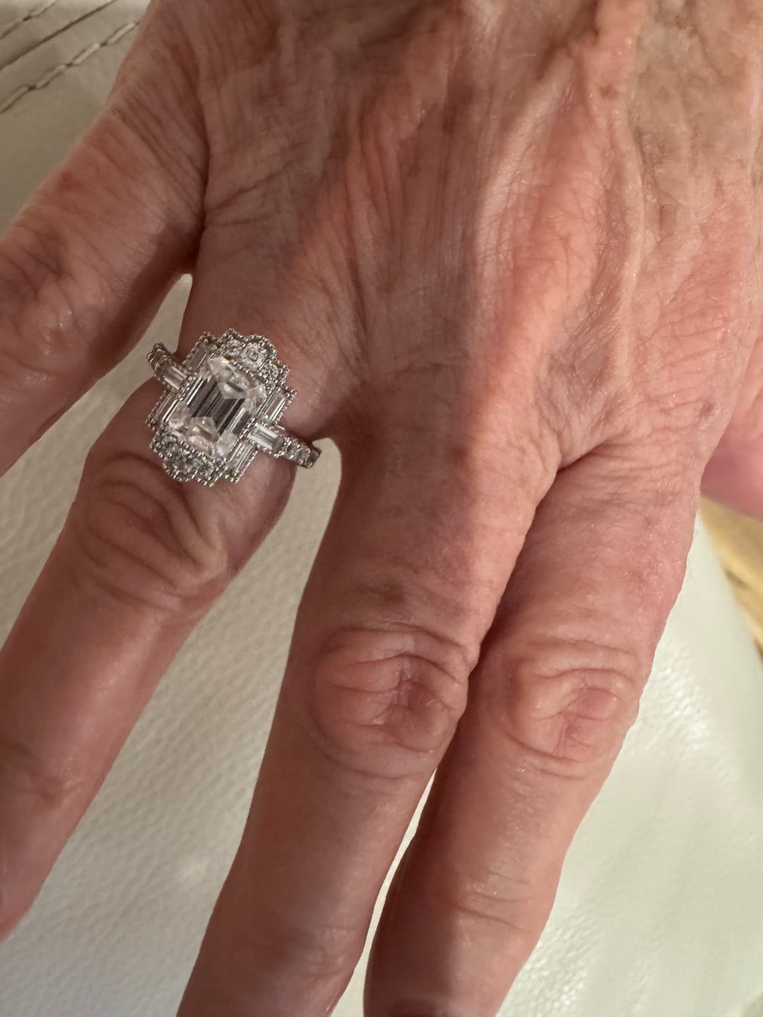 Customer photo review of Art Deco Emerald Cut Moissanite Milgrain Engagement Ring