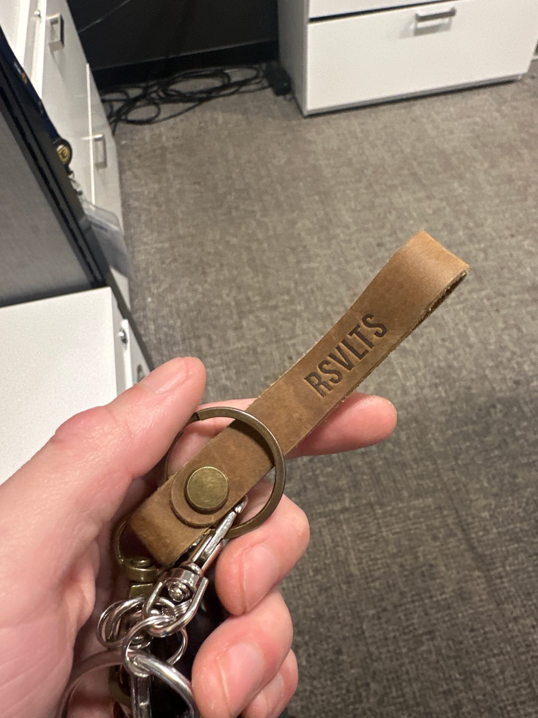 Customer photo review of Dare Mighty – Leather Keychain