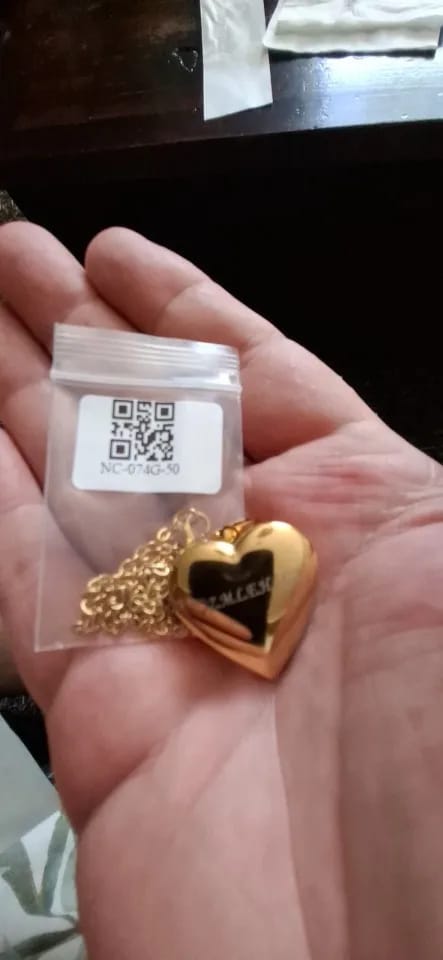 Customer photo review of Stainless Steel Heart Locket Necklace With Photo And Custom Name Date — Gold-Tone | KIMLUD
