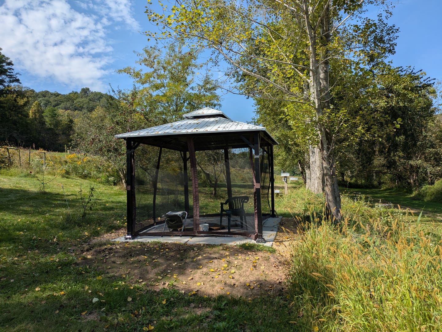 Customer photo review of Shade N' Shelters 10' x 12' Duncan Hardtop Gazebo - Clear View Siding with Hooks