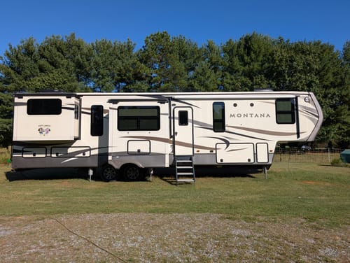 Customer photo review of Camping Partners For Life Doll Couple Sitting Personalized RV Decal