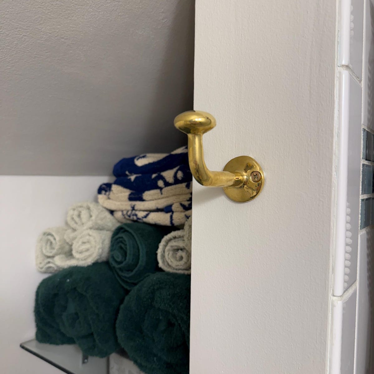 Customer photo review of Unlacquered Brass Hooks Set Of Brass Wall Hangers