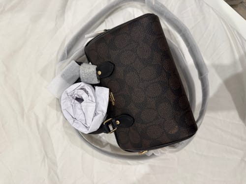 Customer photo review of Mini Rowan Crossbody Bag In Signature Canvas (Gold_Walnut_Black) - disponivel em Portugal